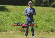 Man flying a quadcopter