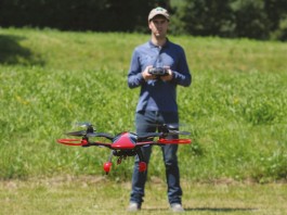Man flying a quadcopter