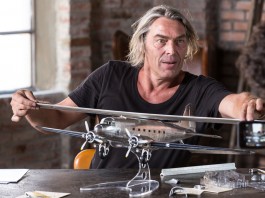 Image of scale modeller working on DC3