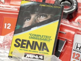 Blog cover image showing Senna DVD and model parts - all included as part of the Senna McLaren MP4/4 model kit from DeAgostini ModelSpace