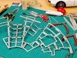 Image of a scale model cutting board with tools and a DeAgostini ModelSpace Millennium Falcon model, as part of a blog about the best Christmas gift ideas for craft lovers