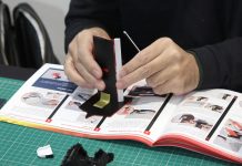 Image of a man building a ModelSpace scale model, as part of a blog about large scale model kits